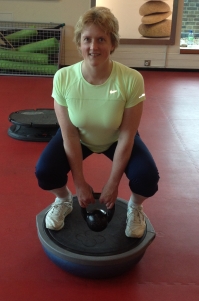 Kettlebell Squat on a Bosu ball