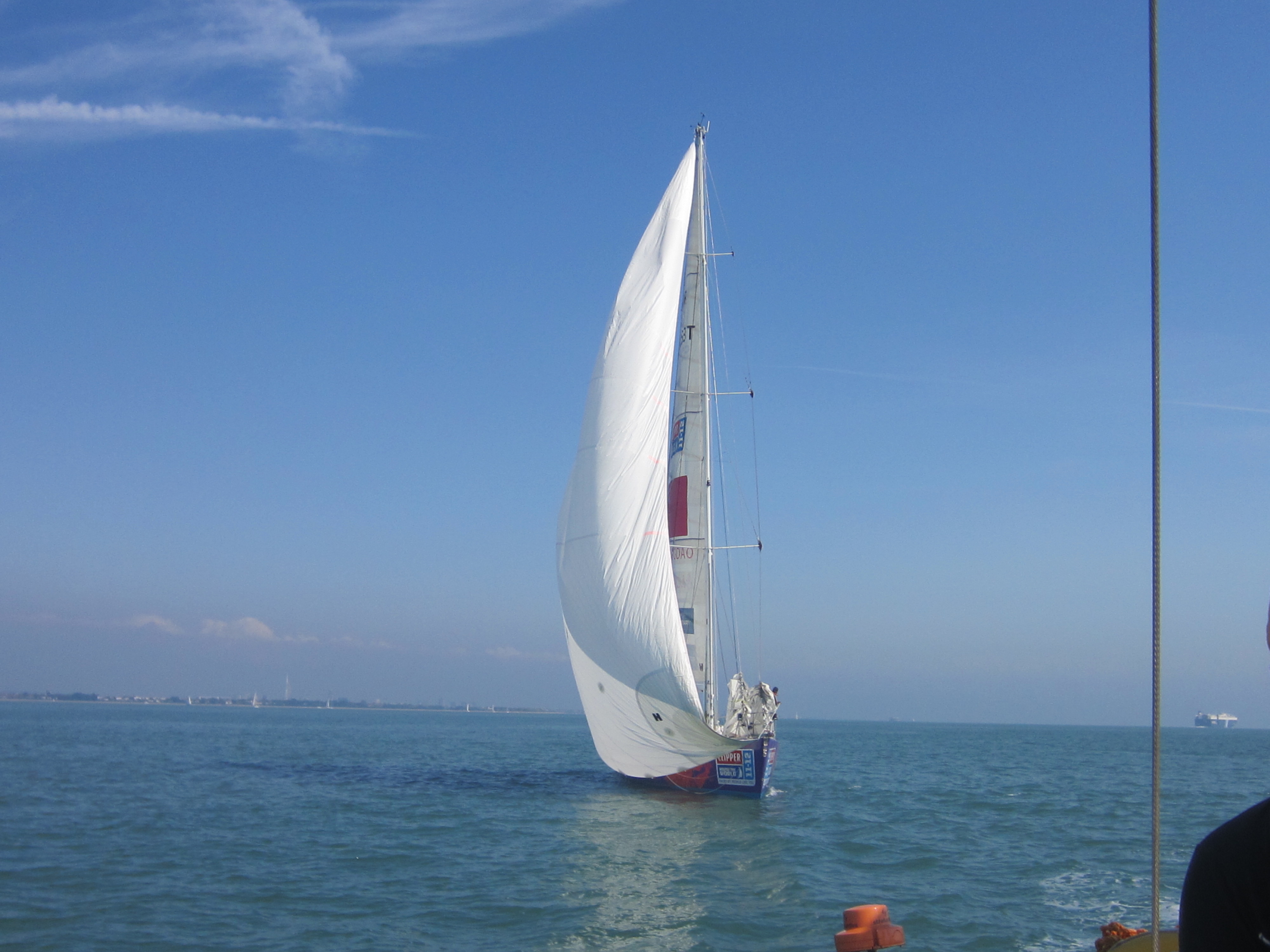 Qingdao flying a spinnaker, taken on another course
